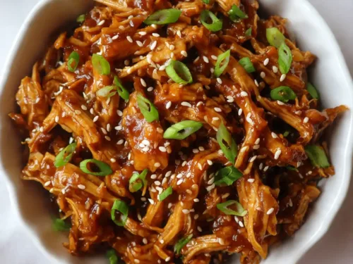 Crockpot Honey Garlic Chicken served in white bowl