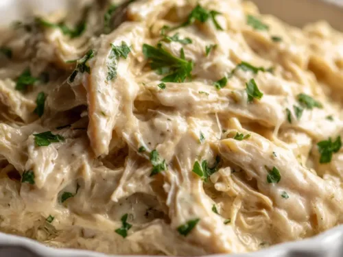 Garlic parm chicken crockpot in rustic bowl