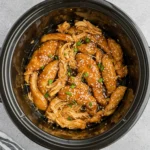 Printable recipe for sweet and sticky honey garlic chicken tenders crockpot