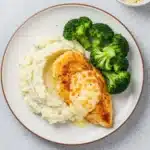 Parmesan crusted chicken at LongHorn with mashed potatoes and broccoli