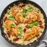 One pan marry me chicken orzo in skillet with basil